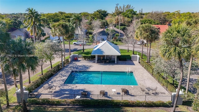 view of pool featuring a patio area, fence, and a fenced in pool