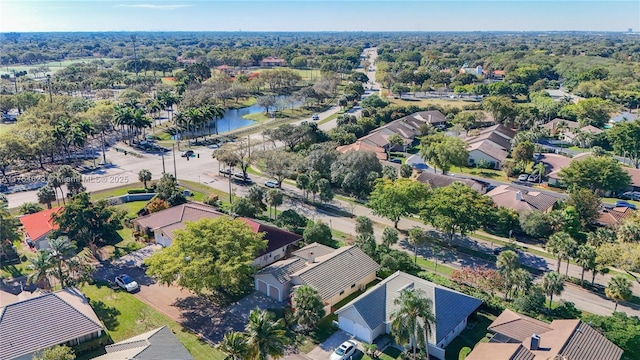 aerial view featuring a residential view and a water view