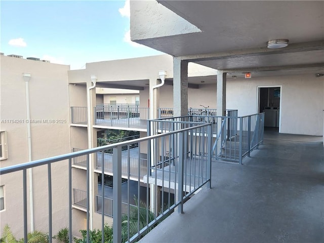 balcony with washer / dryer