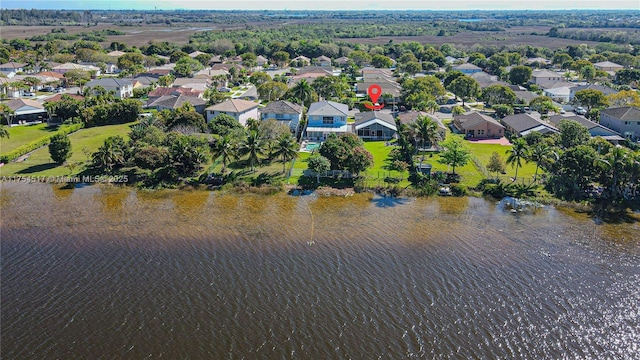 bird's eye view with a water view and a residential view