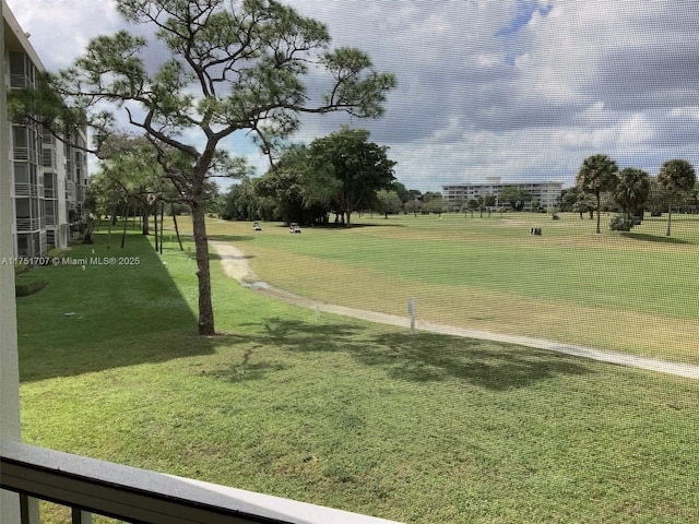 view of home's community featuring a yard