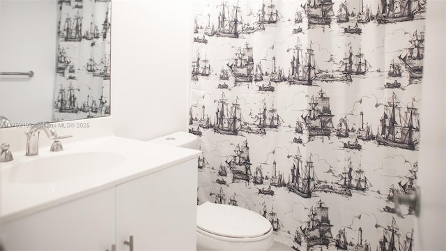 half bath with toilet and vanity