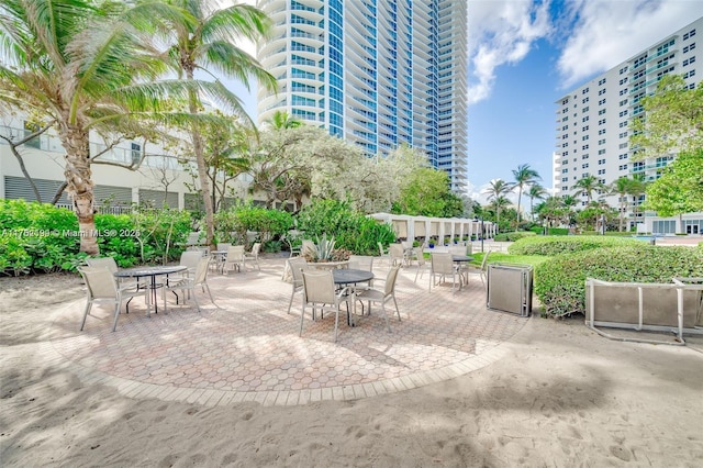 view of home's community featuring a patio area