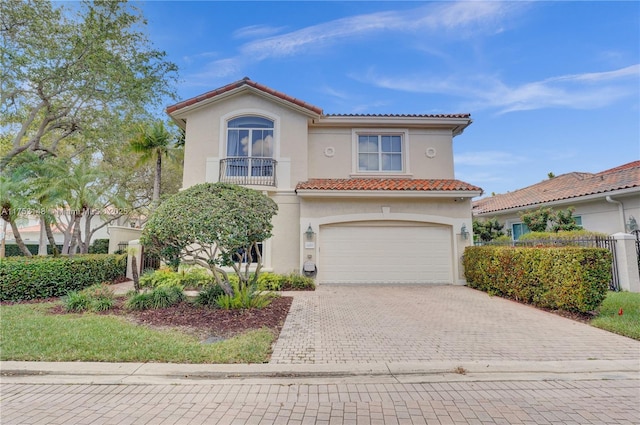 1468 Mariner Way, Hollywood, FL 33019 - mediterranean / spanish home featuring stucco siding, decorative driveway, a balcony, an attached garage, and a tile roof