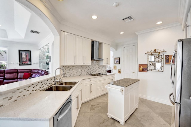 1468 Mariner Way, Hollywood, FL 33019 - kitchen featuring stainless steel appliances, wall chimney range hood, arched walkways, ornamental molding, and recessed lighting