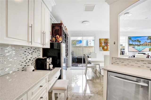 1468 Mariner Way, Hollywood, FL 33019 - kitchen with stainless steel dishwasher, decorative backsplash, crown molding, white cabinetry, and light countertops