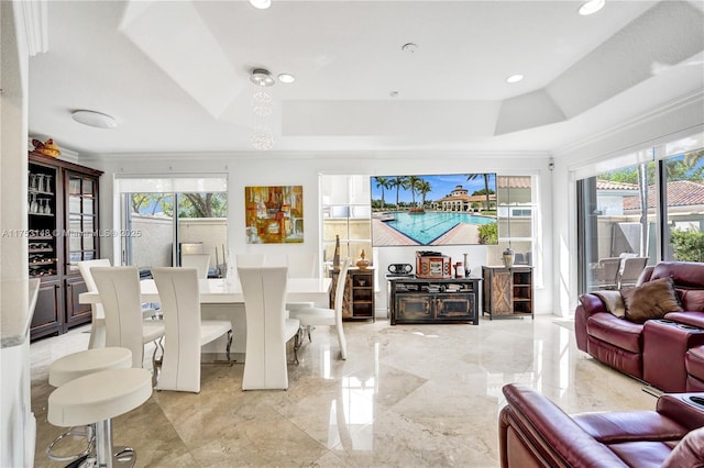 1468 Mariner Way, Hollywood, FL 33019 - living area with a tray ceiling, light marble finish flooring, ornamental molding, and recessed lighting