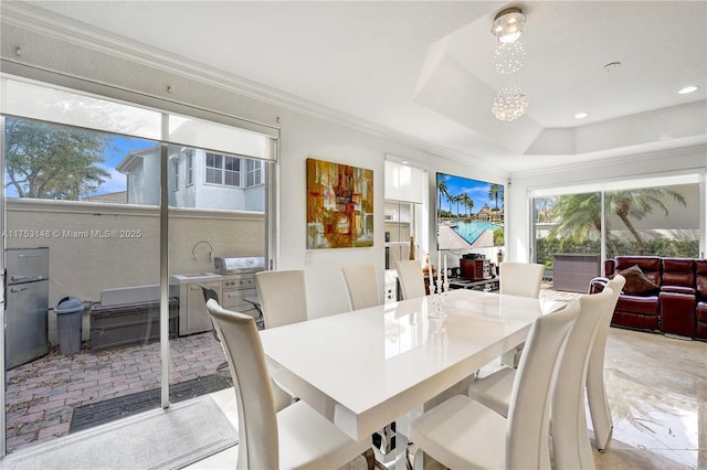 1468 Mariner Way, Hollywood, FL 33019 - dining area with ornamental molding, a chandelier, a raised ceiling, and recessed lighting