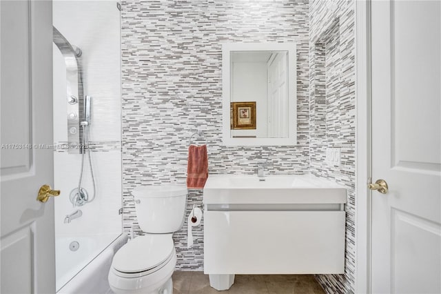 1468 Mariner Way, Hollywood, FL 33019 - full bathroom featuring vanity, tile walls,  shower combination, and tile patterned floors