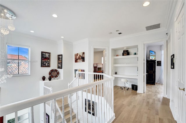 1468 Mariner Way, Hollywood, FL 33019 - hallway with an upstairs landing, light wood-type flooring, recessed lighting, ornamental molding, and built in features