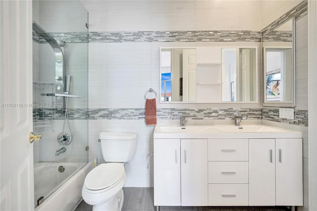 1468 Mariner Way, Hollywood, FL 33019 - full bathroom featuring shower / washtub combination, double vanity, and tile walls