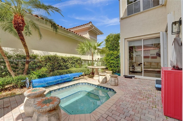 1468 Mariner Way, Hollywood, FL 33019 - view of swimming pool featuring an in-ground hot tub and a patio