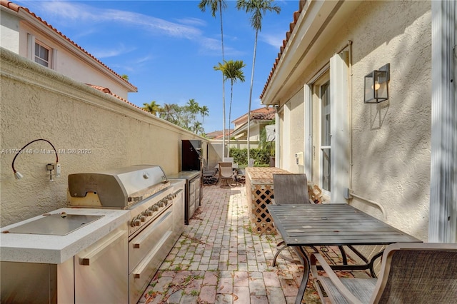 1468 Mariner Way, Hollywood, FL 33019 - view of patio / terrace with an outdoor kitchen and outdoor dining space