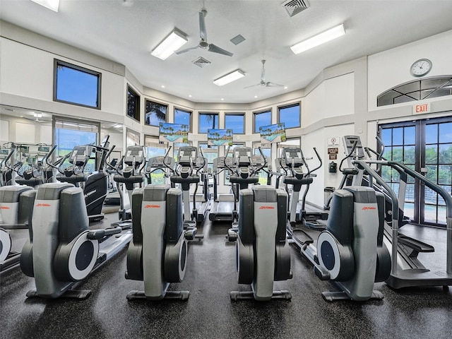 1468 Mariner Way, Hollywood, FL 33019 - gym featuring a ceiling fan and a towering ceiling