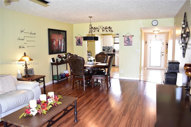 9320 Sunrise Lakes Blvd Unit 306, Sunrise, FL 33322 - living room with baseboards, a textured ceiling, and light wood finished floors