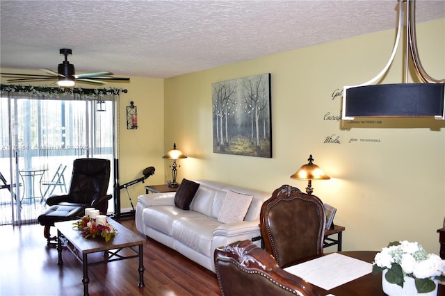 9320 Sunrise Lakes Blvd Unit 306, Sunrise, FL 33322 - living area featuring a textured ceiling, ceiling fan, and wood finished floors