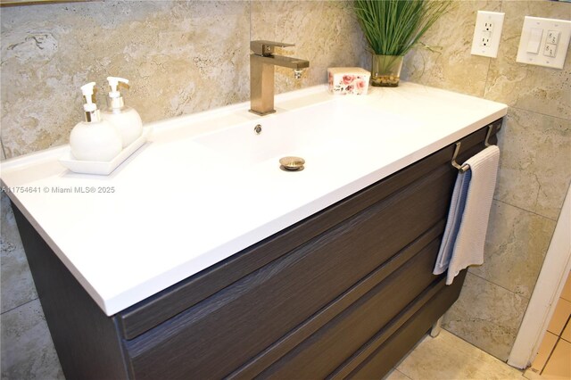 9320 Sunrise Lakes Blvd Unit 306, Sunrise, FL 33322 - bathroom featuring tile walls and vanity