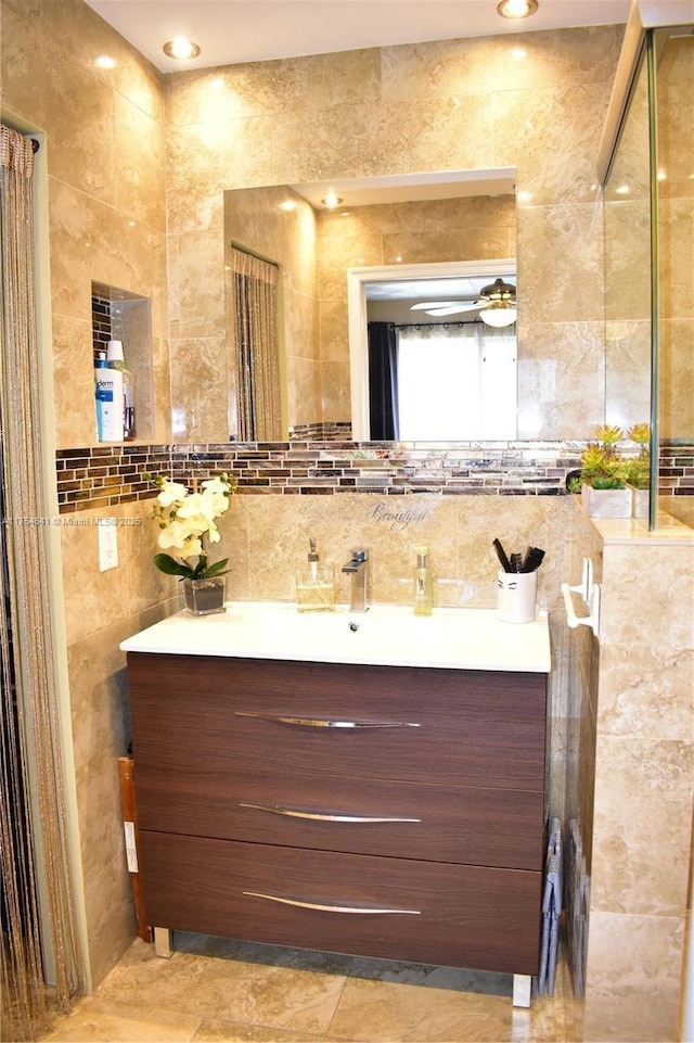 9320 Sunrise Lakes Blvd Unit 306, Sunrise, FL 33322 - bathroom with tile walls and vanity