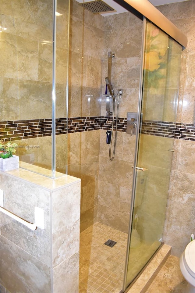 9320 Sunrise Lakes Blvd Unit 306, Sunrise, FL 33322 - bathroom featuring a stall shower and toilet