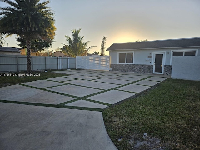 yard at dusk with fence