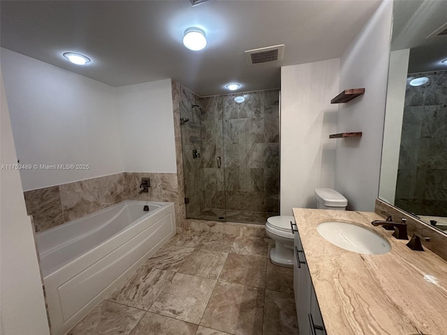 full bath featuring a garden tub, toilet, vanity, visible vents, and a stall shower