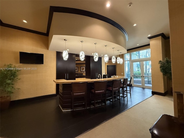 bar with recessed lighting, french doors, crown molding, and baseboards