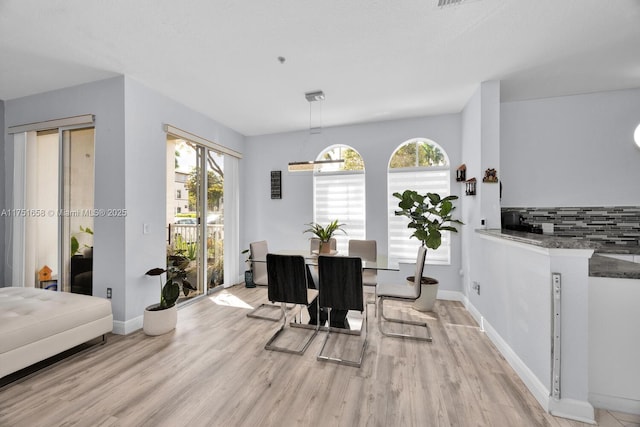 4331 SW 160th Ave Unit 108, Miramar, FL 33027 - dining space featuring light wood finished floors and baseboards
