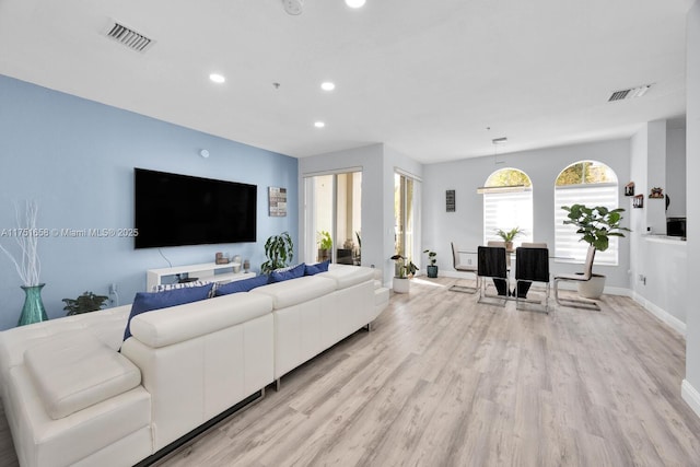 4331 SW 160th Ave Unit 108, Miramar, FL 33027 - living area featuring recessed lighting, light wood finished floors, and baseboards