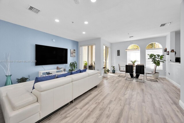 4331 SW 160th Ave Unit 108, Miramar, FL 33027 - living area featuring recessed lighting, light wood-type flooring, and baseboards