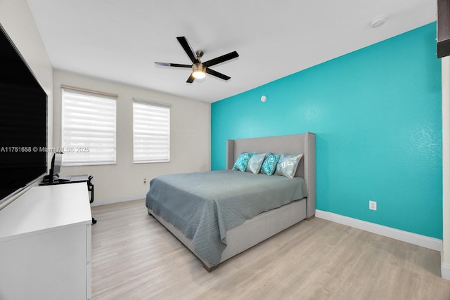 4331 SW 160th Ave Unit 108, Miramar, FL 33027 - bedroom featuring light wood-style floors, baseboards, and a ceiling fan