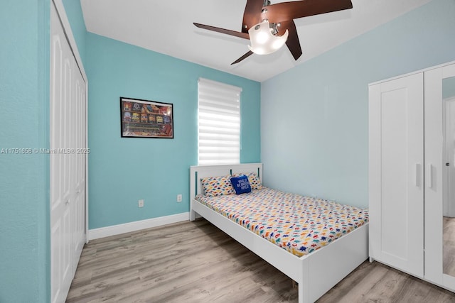 4331 SW 160th Ave Unit 108, Miramar, FL 33027 - bedroom featuring light wood finished floors, a closet, baseboards, and a ceiling fan