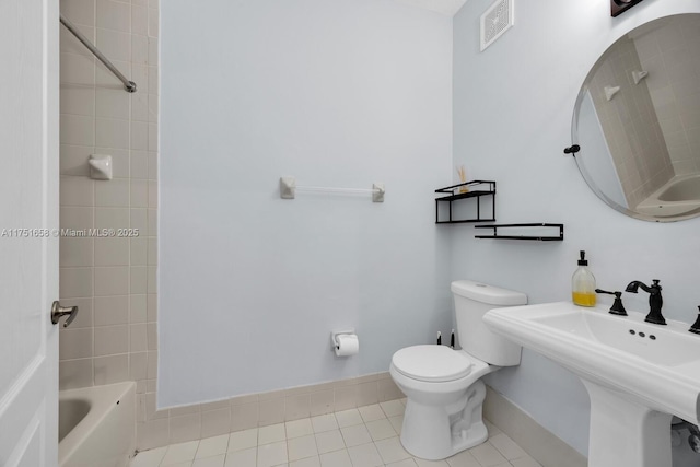 4331 SW 160th Ave Unit 108, Miramar, FL 33027 - full bath with baseboards, tile patterned flooring, toilet, bathtub / shower combination, and a sink