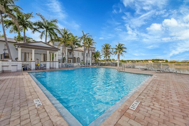 4331 SW 160th Ave Unit 108, Miramar, FL 33027 - community pool with a patio