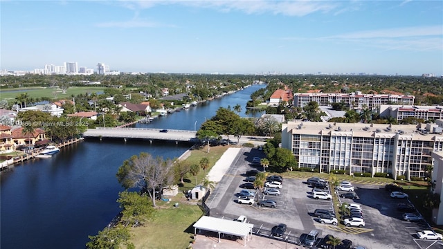 drone / aerial view with a view of city and a water view