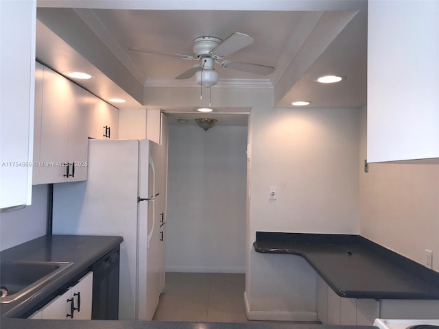 kitchen with crown molding, dark countertops, recessed lighting, white cabinets, and dishwasher