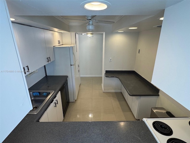 851 Three Islands Blvd Unit 411, Hallandale Beach, FL 33009 - kitchen featuring dark countertops, ceiling fan, white cabinets, electric range, and freestanding refrigerator