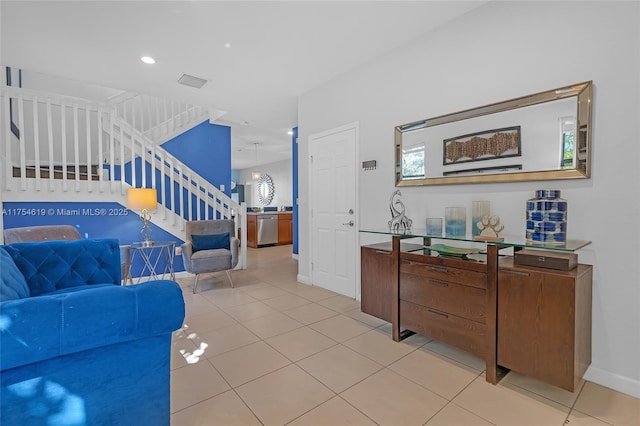 25340 SW 116th Ave, Homestead, FL 33032 - living area with baseboards, stairs, visible vents, and light tile patterned flooring