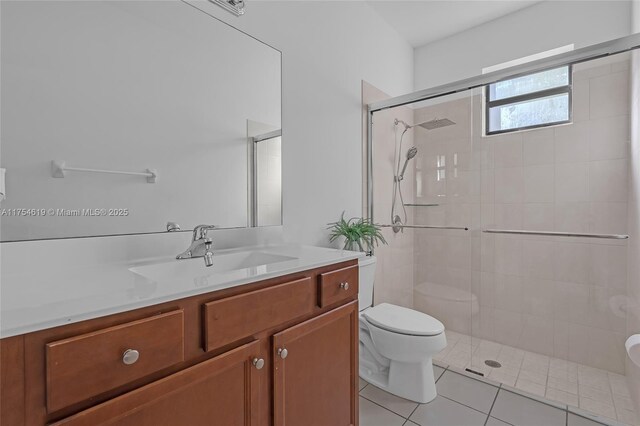 25340 SW 116th Ave, Homestead, FL 33032 - full bathroom featuring a stall shower, tile patterned flooring, vanity, and toilet