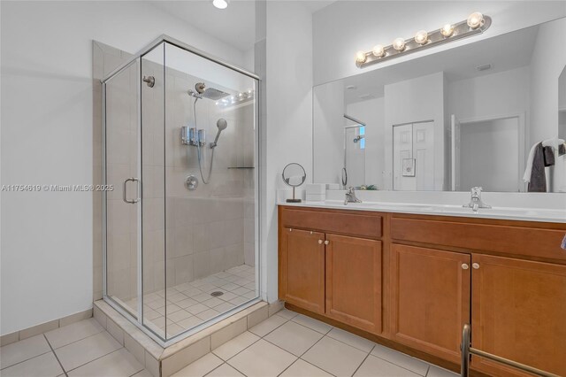 25340 SW 116th Ave, Homestead, FL 33032 - full bath featuring a stall shower, tile patterned flooring, a sink, and double vanity