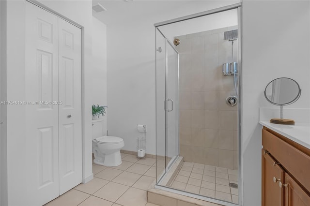 25340 SW 116th Ave, Homestead, FL 33032 - bathroom with a stall shower, a closet, vanity, and toilet