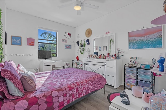 25340 SW 116th Ave, Homestead, FL 33032 - bedroom with a ceiling fan and wood finished floors