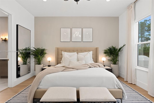 bedroom with light wood-style flooring