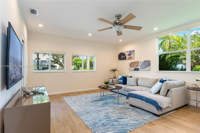living room featuring recessed lighting, visible vents, wood finished floors, and ceiling fan