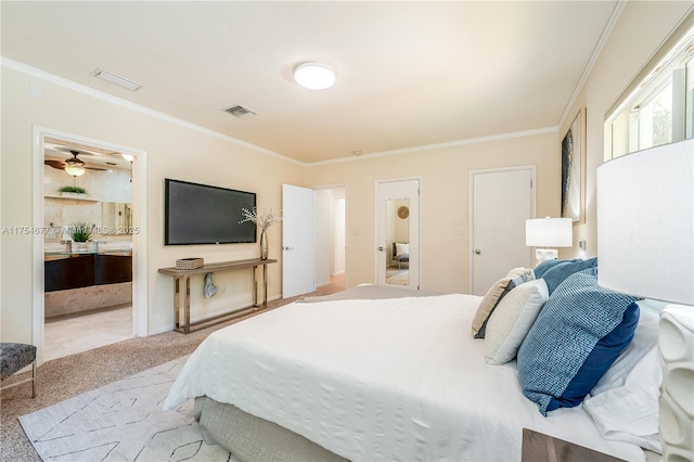 carpeted bedroom with ornamental molding, visible vents, and connected bathroom