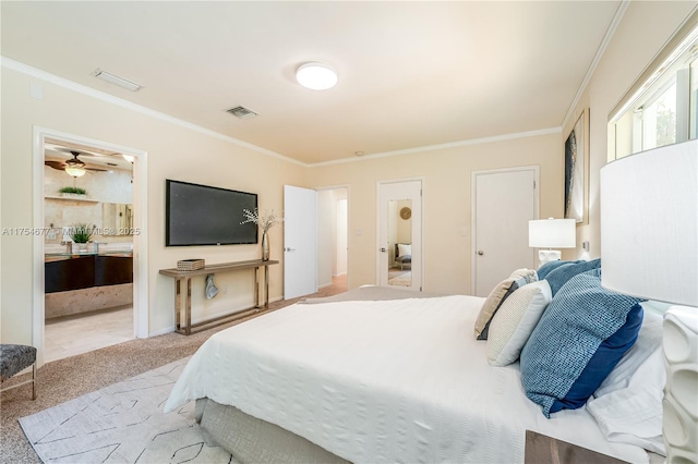 bedroom with crown molding, carpet flooring, visible vents, and connected bathroom