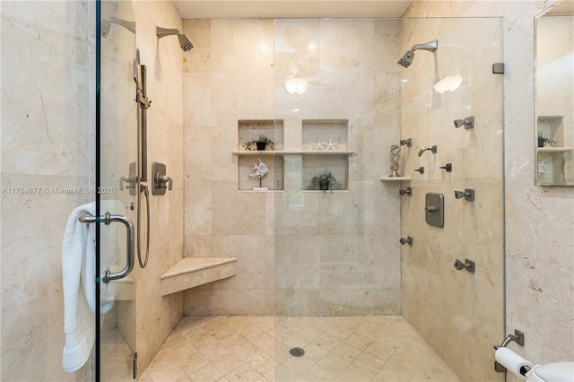 bathroom featuring a shower stall