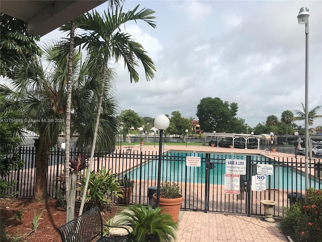 pool featuring fence