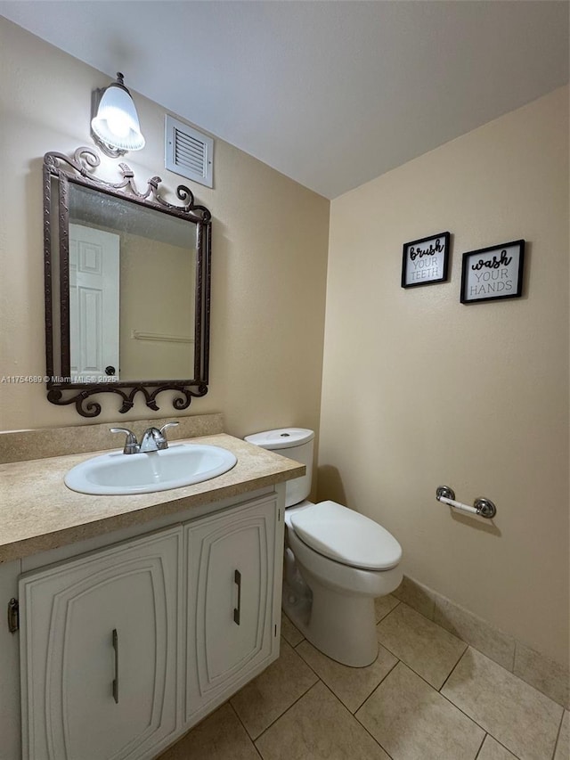 851 Three Islands Blvd Unit 218, Hallandale Beach, FL 33009 - half bath with vanity, tile patterned floors, and toilet