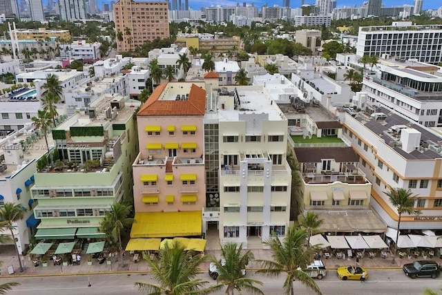 drone / aerial view featuring a city view