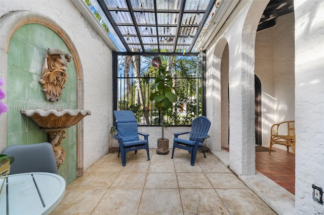 view of patio with a lanai